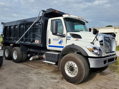 Dump-truck-with-City-of-Melbourne-logo-and-Streets-and-Stormwater-Division-label.jpg