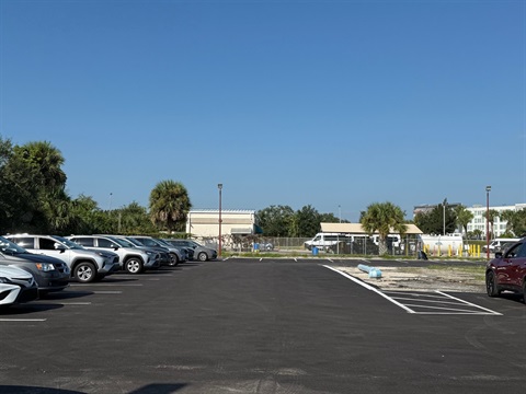 Cars parked in repaved parking lot at Melbourne Orlando International Airport