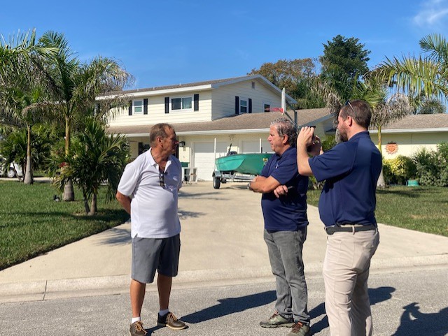 Samuel Plummer being interviewed by News 13 reporters Greg Pallone and Jon Shaban