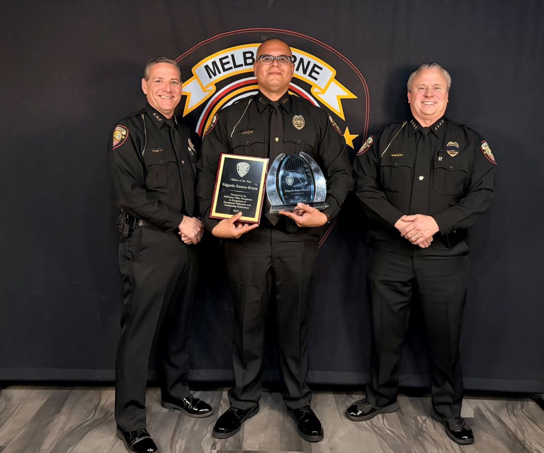 Patrol Officer of the Year Edgardo Ramos-Reyes with Deputy Chief Waltemeyer and Chief Gillespie